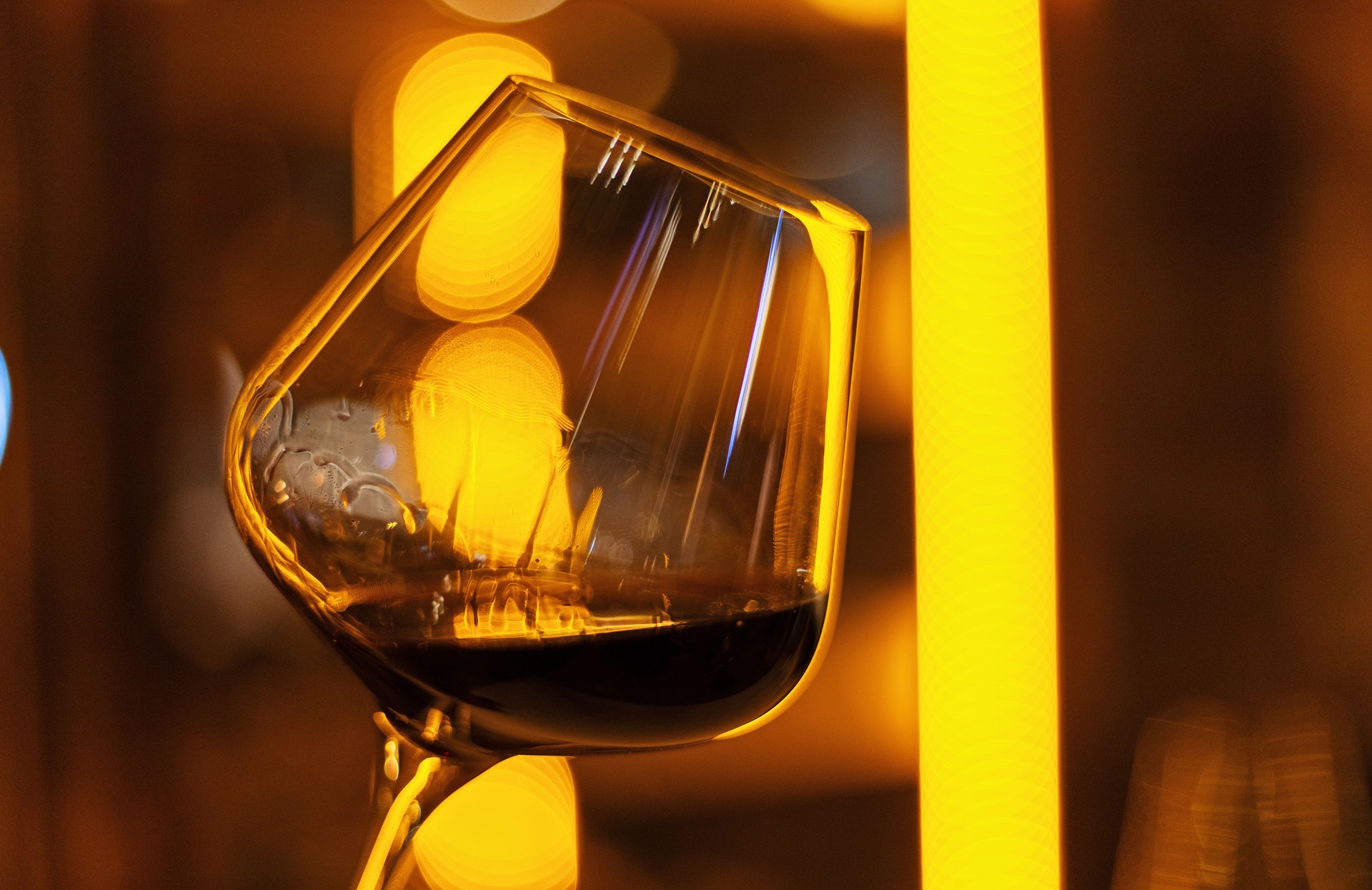 Elegant Glass of Wine in a Warm Ambient Setting